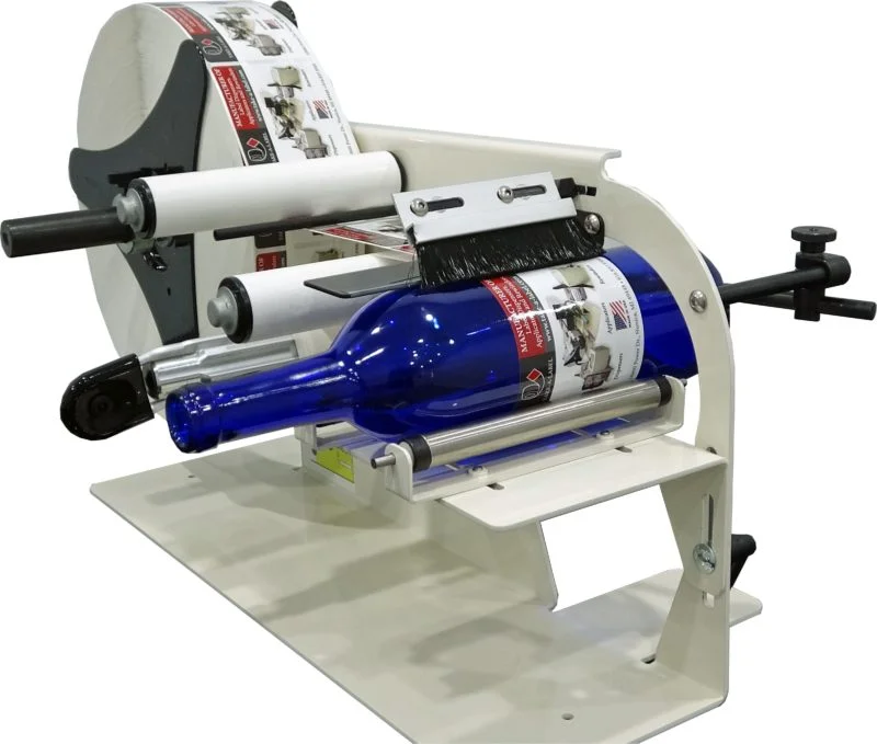 The TAL-1100M/R Manual Round Product Labeler will label virtually any round product