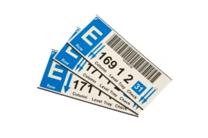 magnetic rack labels with text, arrows and a barcode
